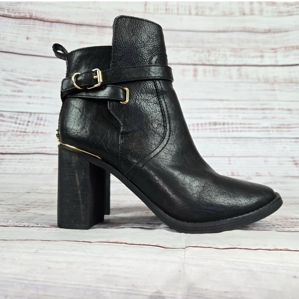Tory Burch Black Heeled Boots with Gold Accents
